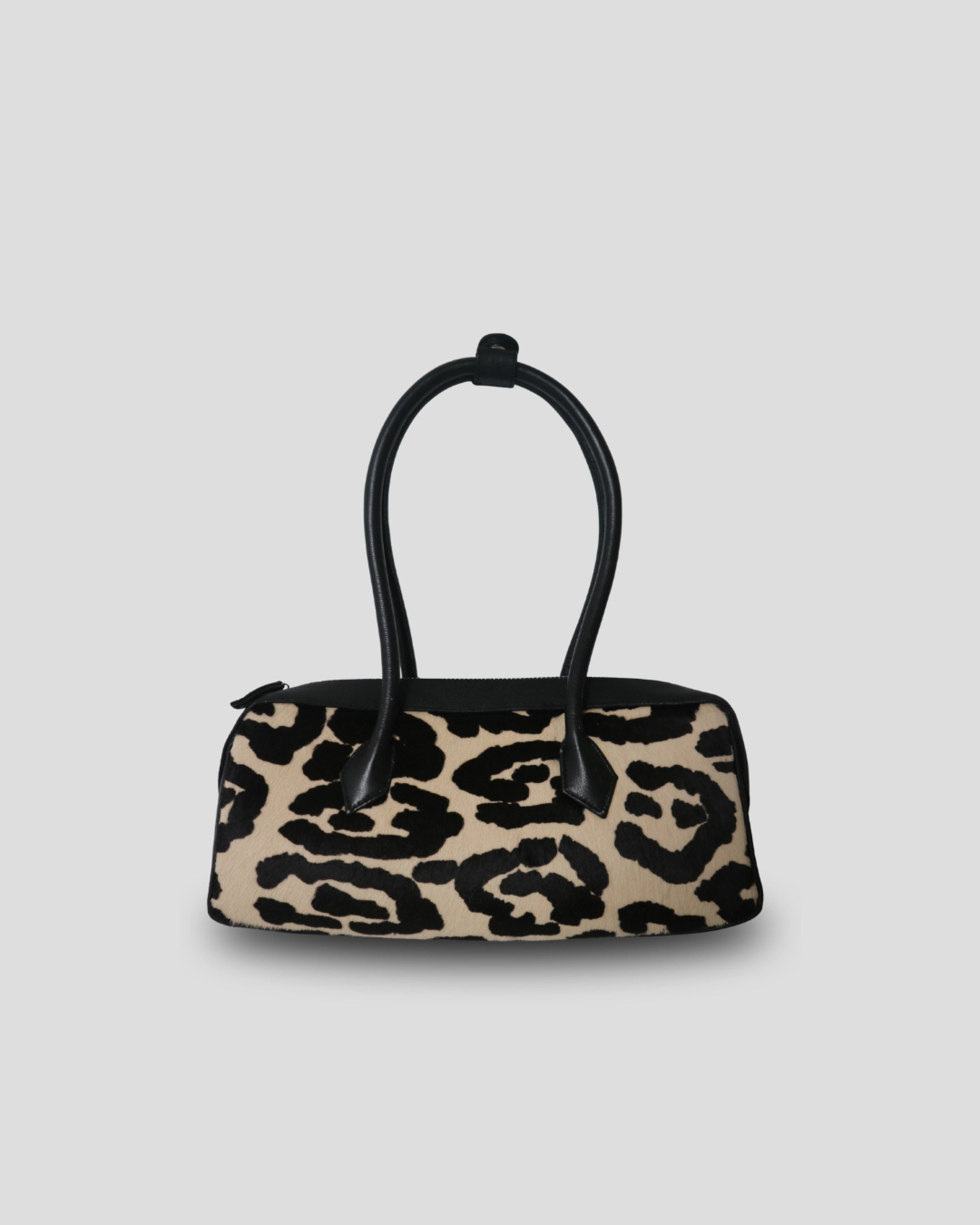 Cila Cow Print genuine leather handbag in Noir Bloom pattern – bold black cowhide structured bag