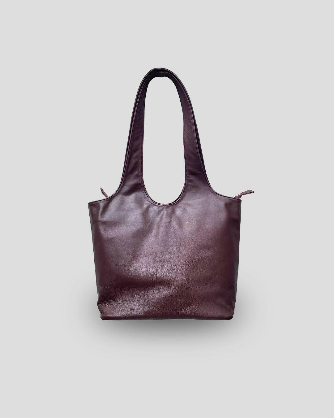 Premium Bali leather shoulder bag handcrafted by Indonesian artisans - Ani minimalist elegant design