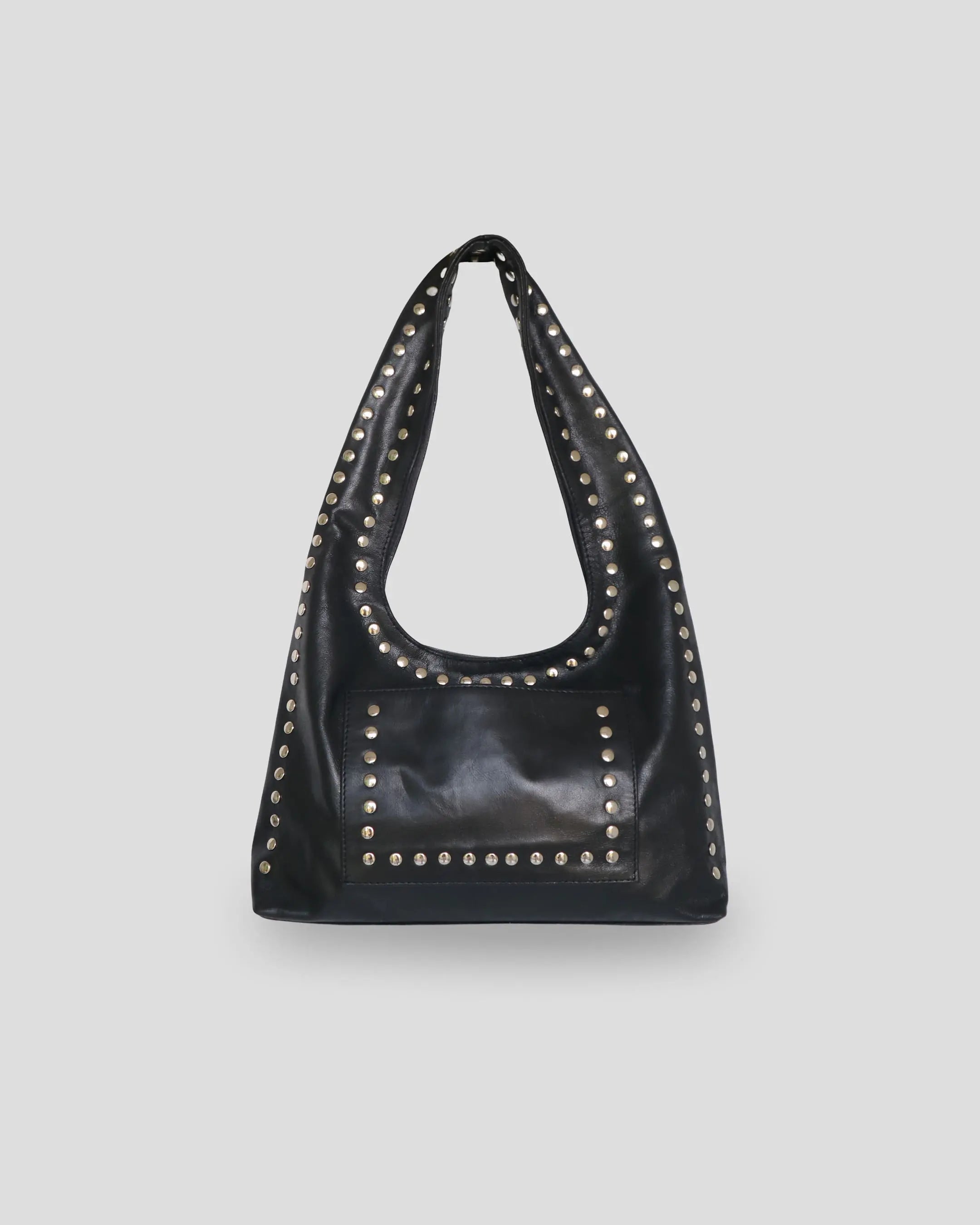 Black leather handbag with studs on a light gray background