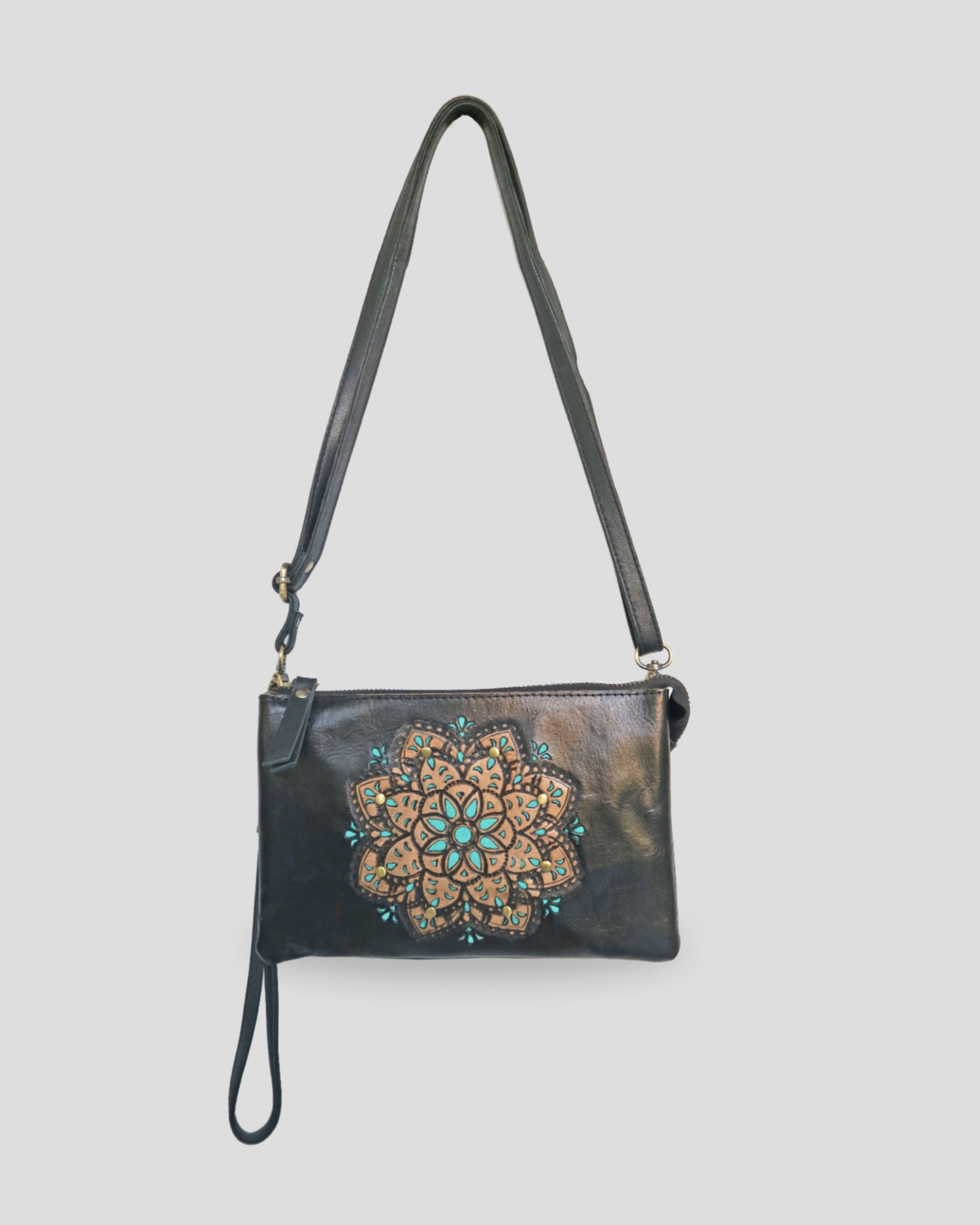 Flo carving sling bag by Nam Leather Bali
