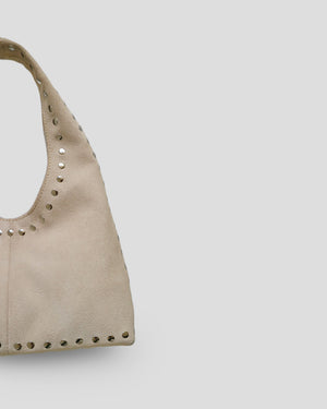 Handmade Bali leather bag back view displaying traditional Indonesian craftsmanship quality
