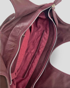 Indonesia leather goat leather bag interior showing zipper closure and multiple pockets