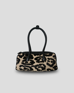 Cila Cow Print genuine leather handbag in Noir Bloom pattern – bold black cowhide structured bag