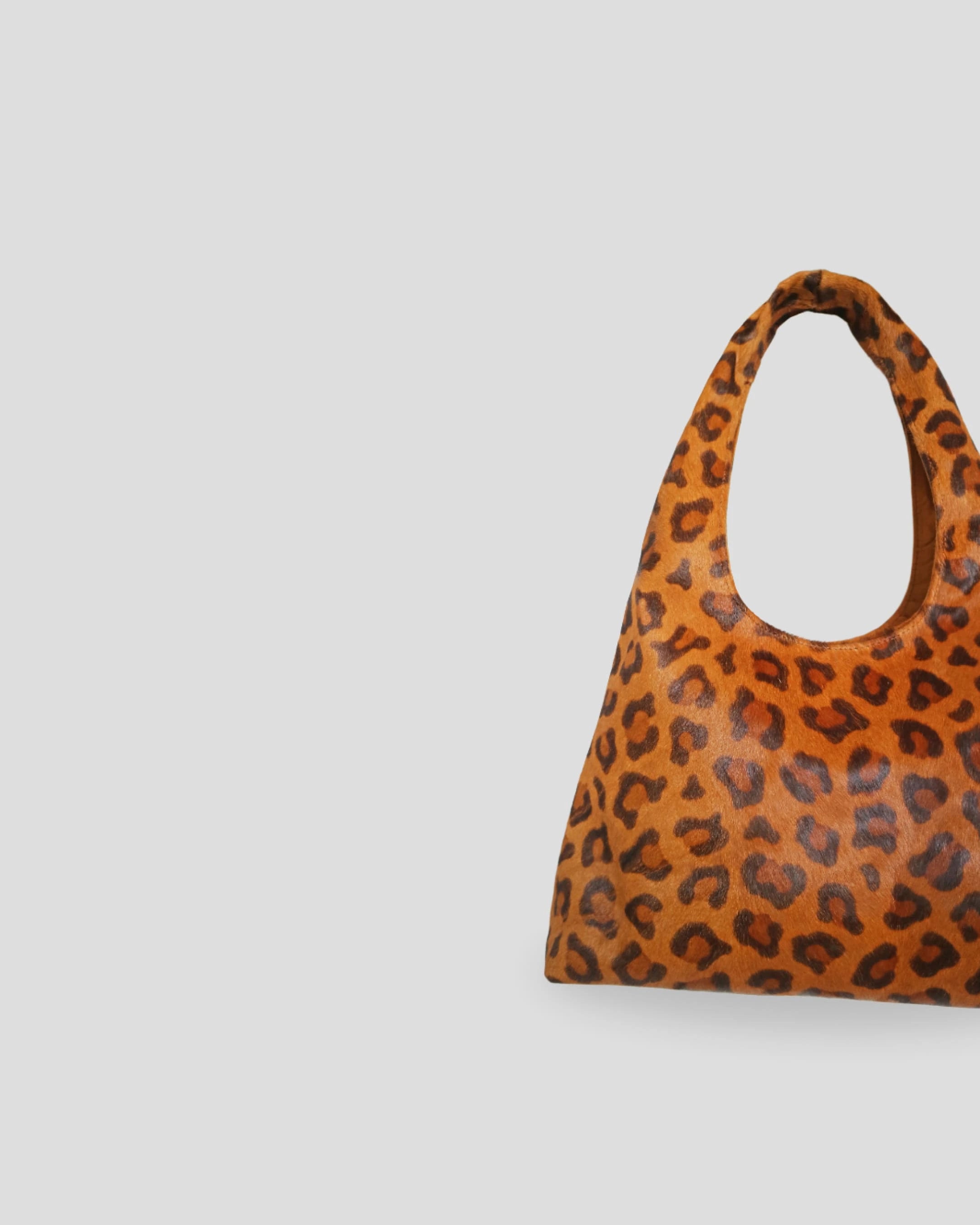 Cowhide animal print shoulder bag women Canada leather handle detail leopard motif