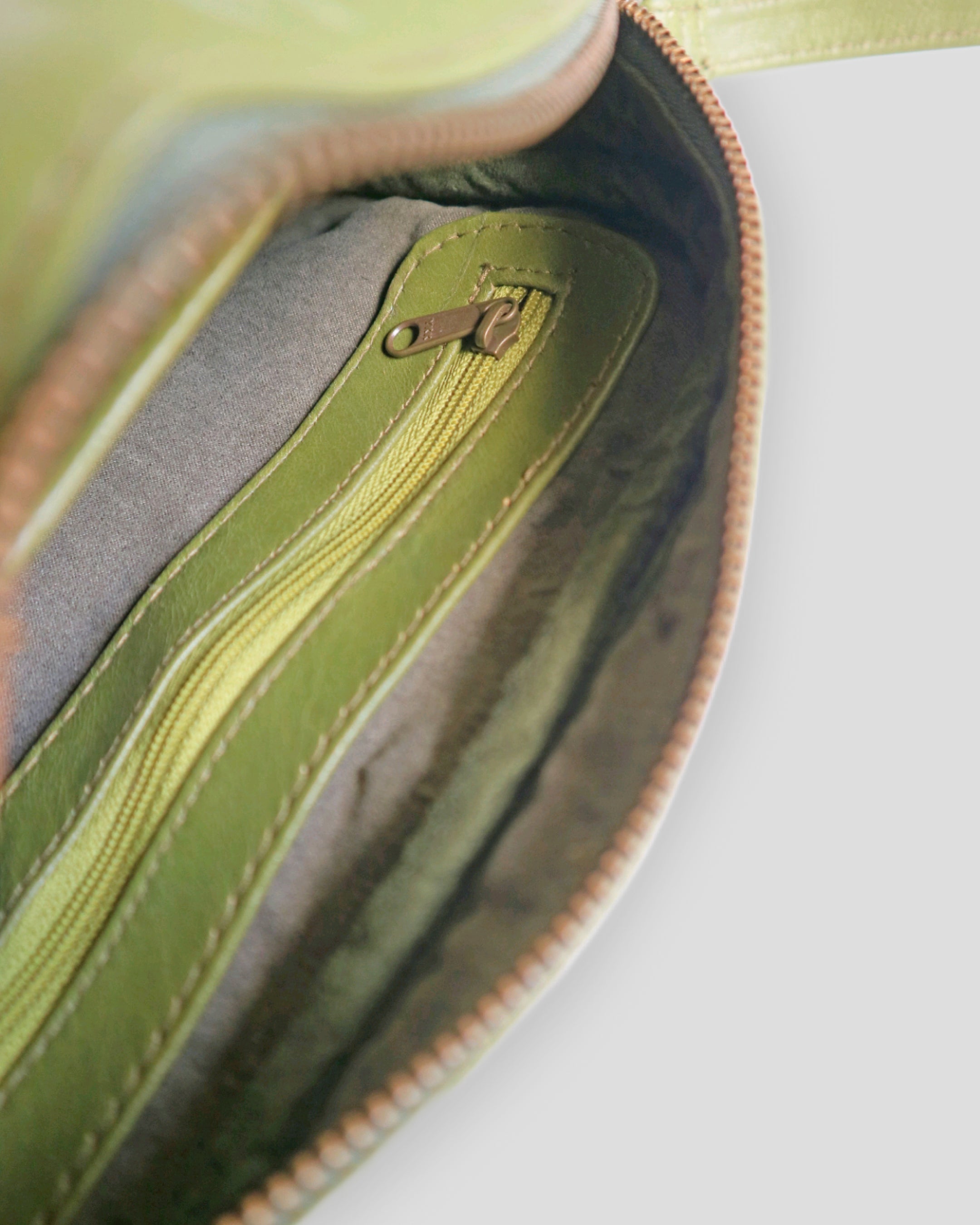 Early stud sling bag by Nam Leather Bali