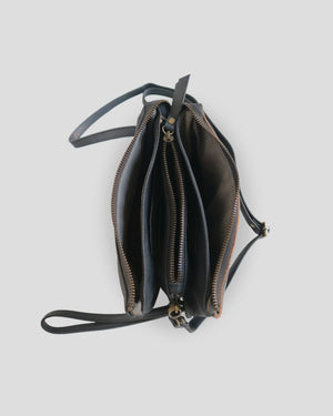 Flo carving sling bag by Nam Leather Bali