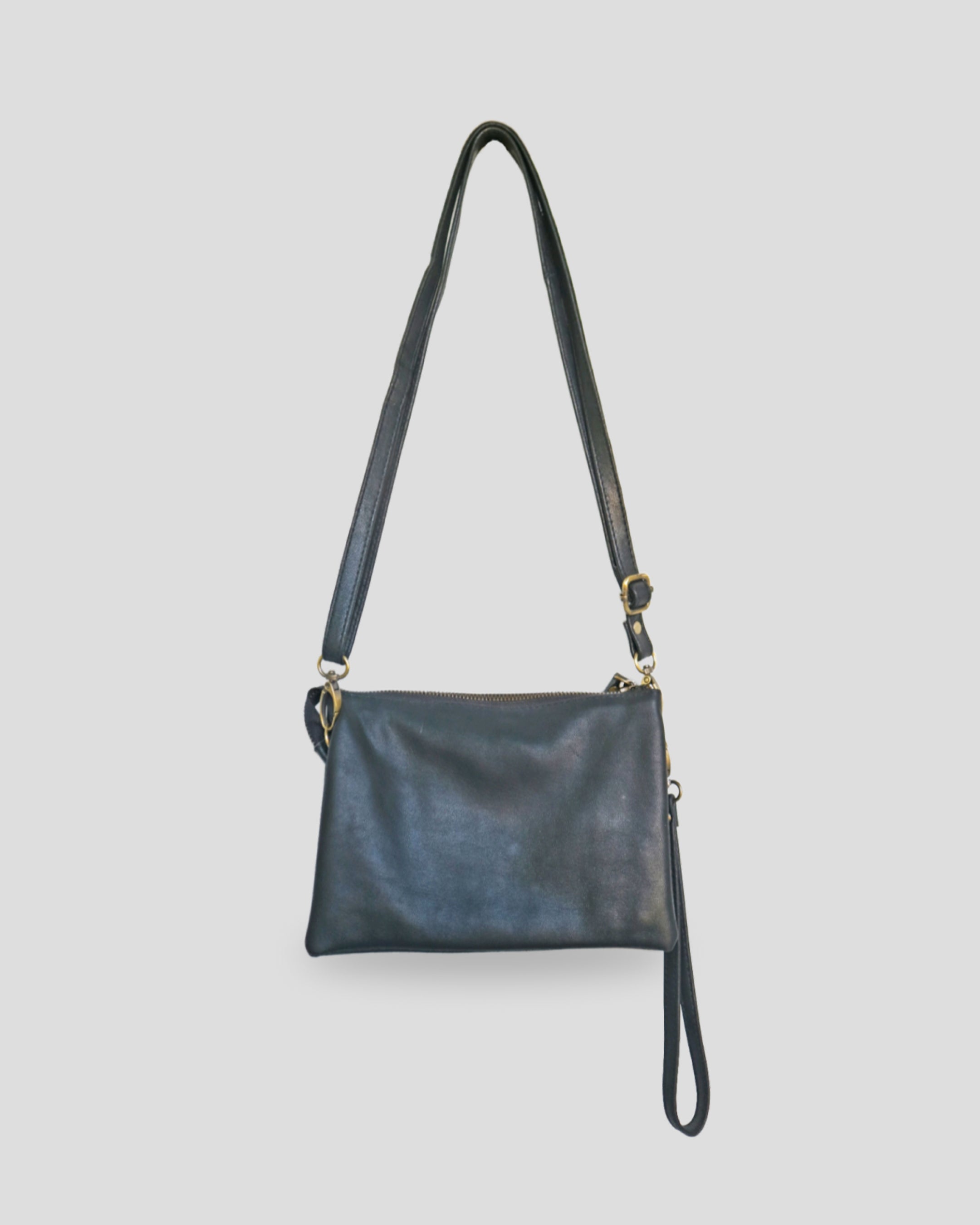 Flo carving sling bag by Nam Leather Bali