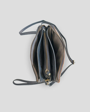 Flo carving sling bag by Nam Leather Bali