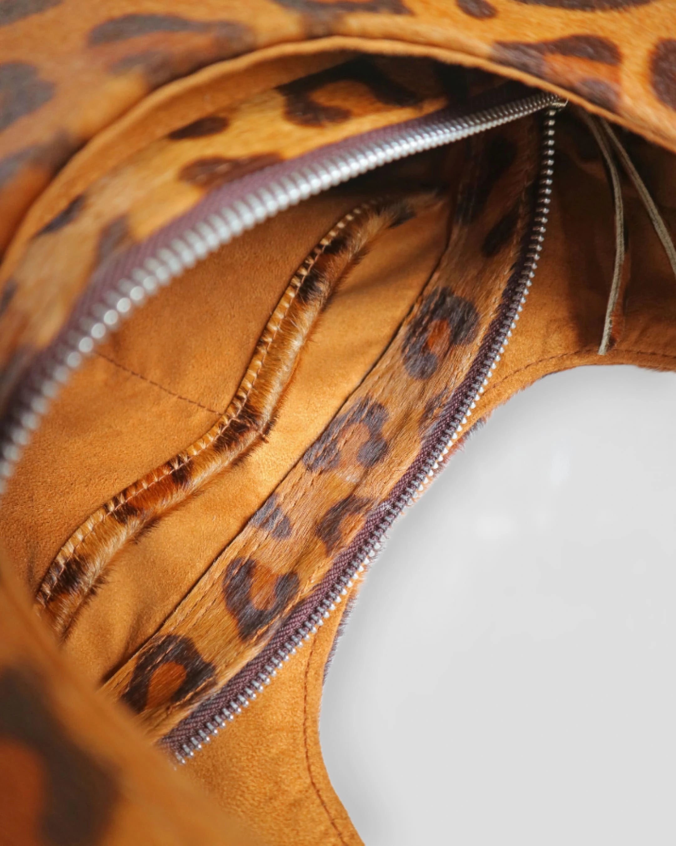 Animal print leather shoulder bag women France cowhide pouch detail cow print pattern