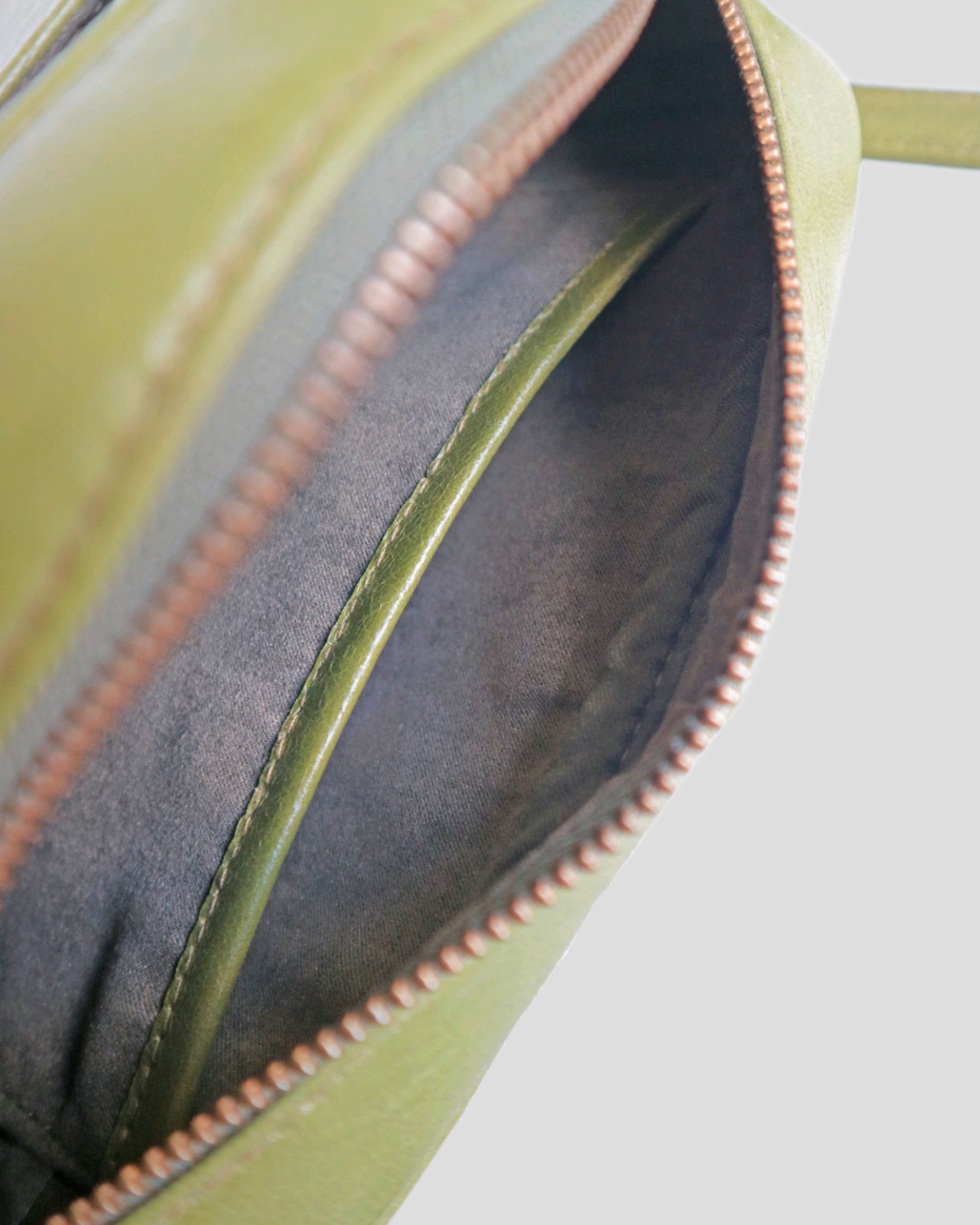 Early stud sling bag by Nam Leather Bali