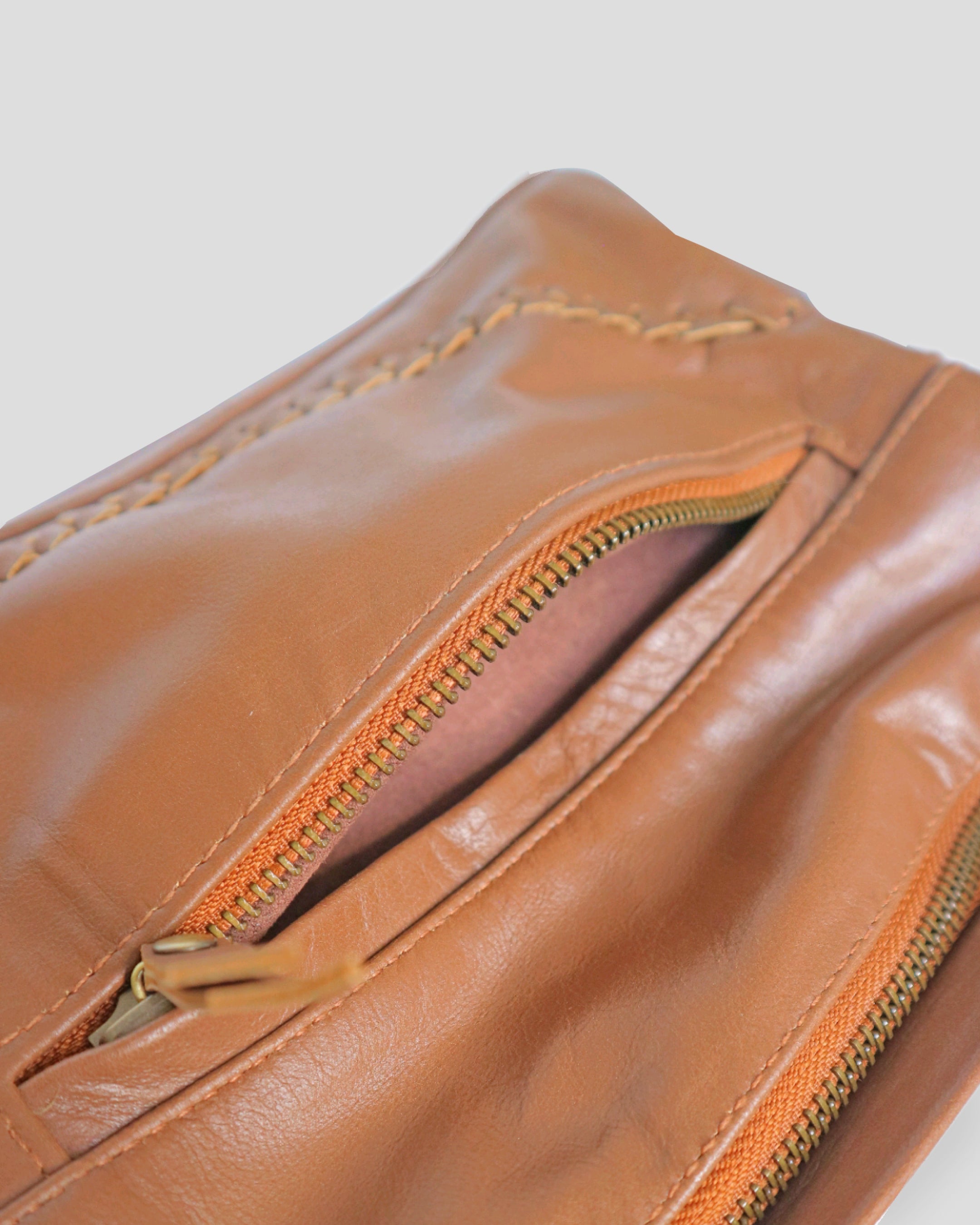 One Pocket Anyam sling bag by Nam Leather Bali